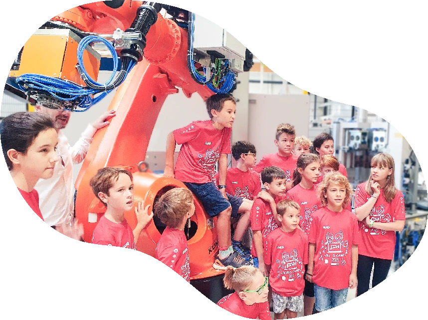 Kindergruppe bei Robotik-Workshop – B bits4kids Angebot für Firmen, Gemeinden & Unternehmen